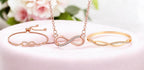 Nilu's Collection Rose Gold Plated Infinity Jewelry Set  Bracelet, Necklace & Kada with American Diamond  For Women And Girls