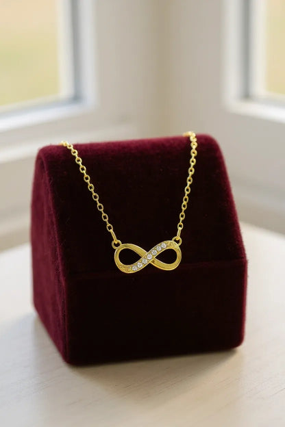 Nilu's Collection Gold Plated Infinity Pendant Necklace with American Diamond Stones For Women And Girls | Anti-Tarnish| Lightweight | Anti- Allergy | Office Wear